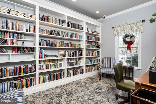 sitting room featuring ornamental molding