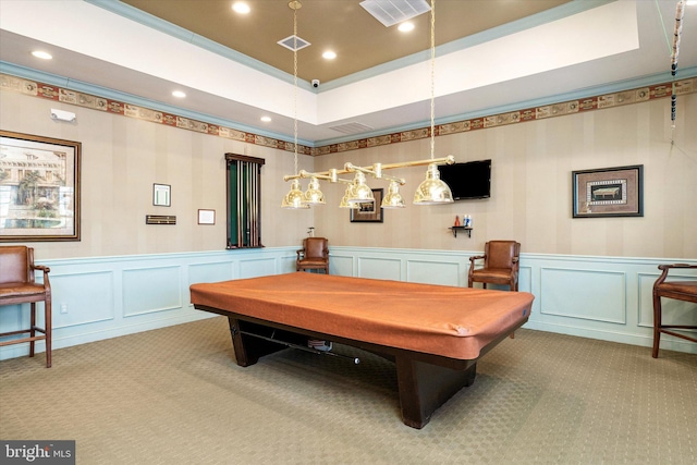 game room with pool table, ornamental molding, and light colored carpet