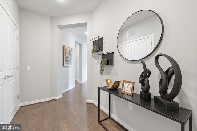 hall featuring dark wood-type flooring