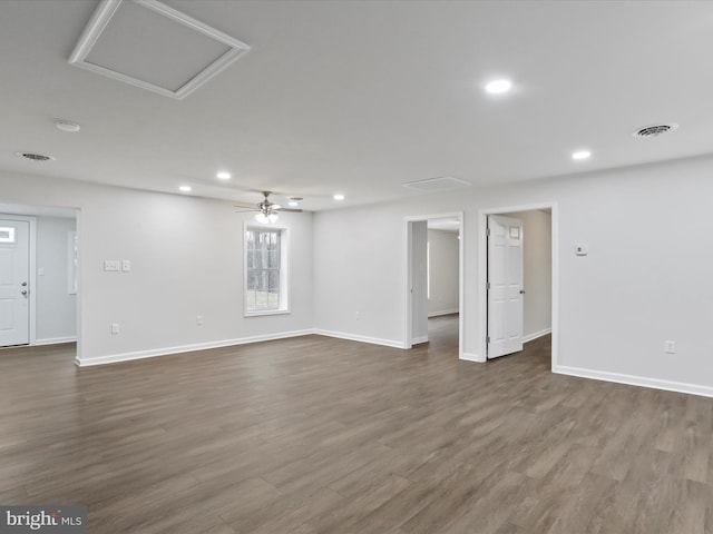 interior space featuring ceiling fan and dark wood-type flooring