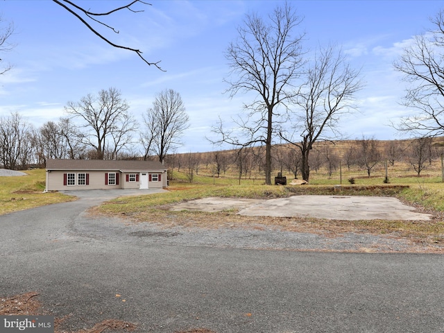 exterior space with a rural view