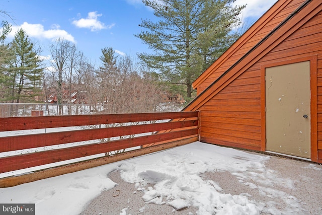 view of snow covered patio