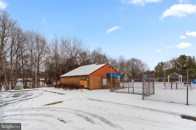 view of yard layered in snow