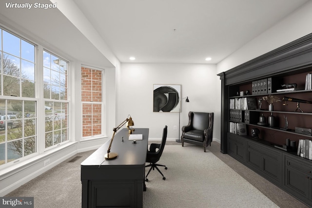 view of carpeted office space