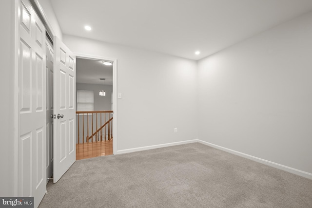 spare room featuring carpet flooring