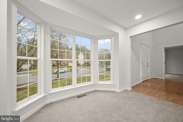 empty room with carpet flooring