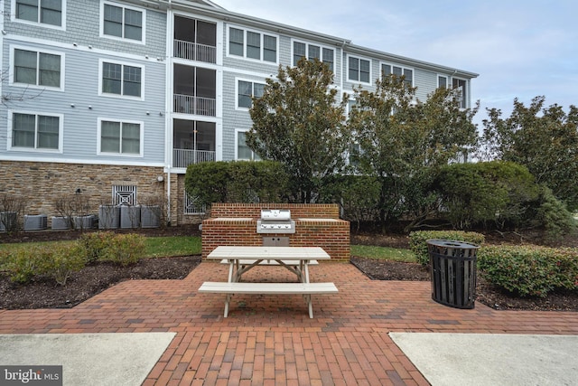 surrounding community featuring a patio area