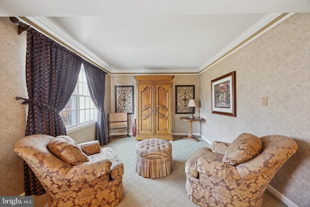 sitting room with crown molding and light colored carpet