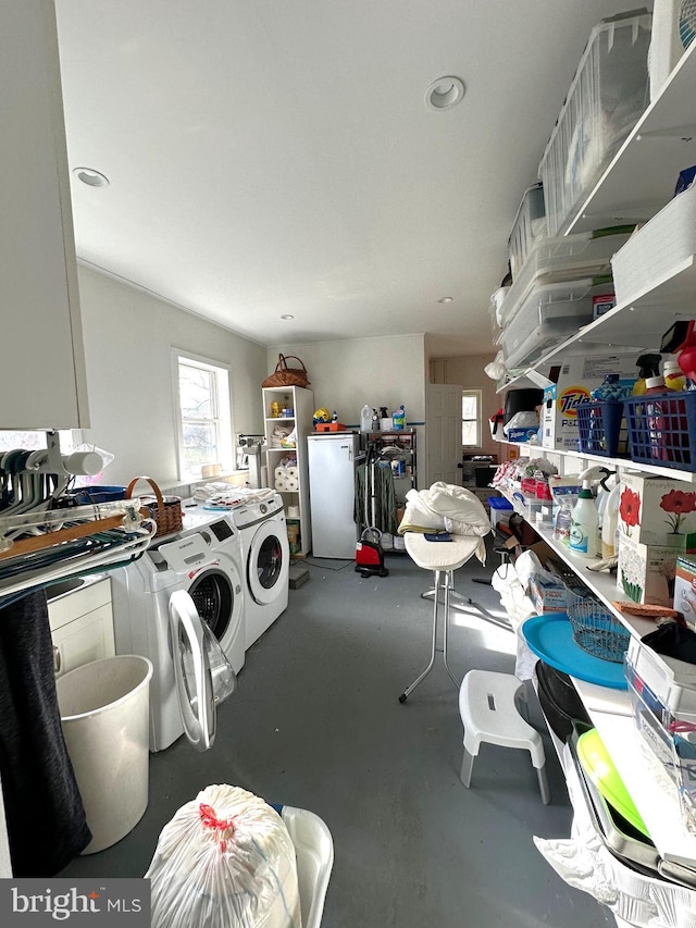 laundry area featuring separate washer and dryer