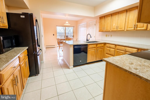 kitchen with sink, hanging light fixtures, light tile patterned floors, kitchen peninsula, and black appliances