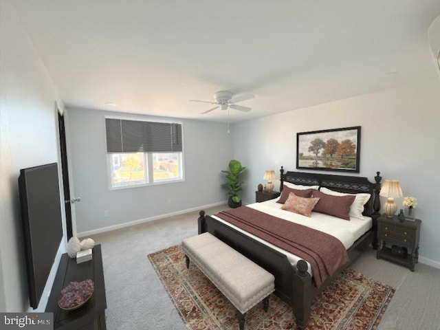 bedroom with ceiling fan and light colored carpet