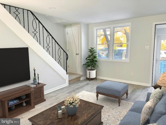 living room featuring light hardwood / wood-style flooring and a wealth of natural light