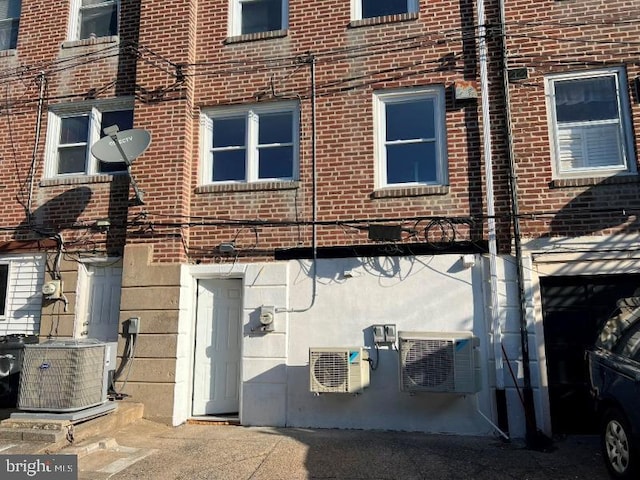 view of home's exterior with central AC unit