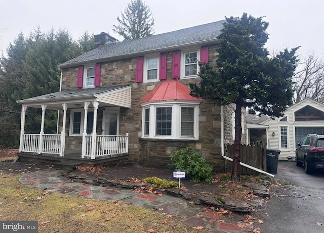 view of front of house with covered porch