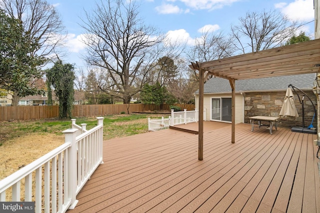 deck with a yard, fence, and a pergola
