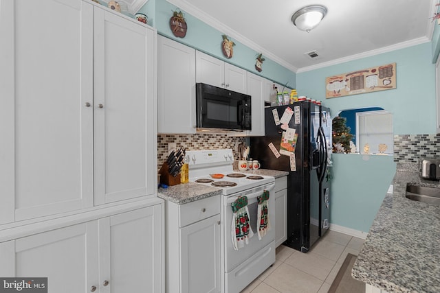 kitchen with black appliances, light tile patterned flooring, white cabinetry, and backsplash