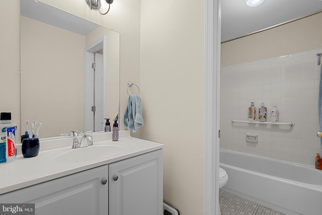 full bathroom with tile patterned floors, shower / washtub combination, vanity, and toilet