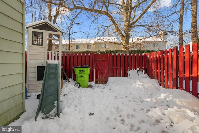 view of yard covered in snow