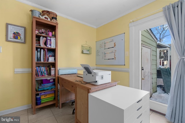 home office featuring crown molding and light tile patterned flooring