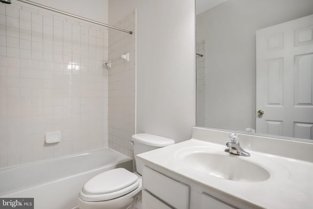 full bathroom featuring vanity, toilet, and tub / shower combination