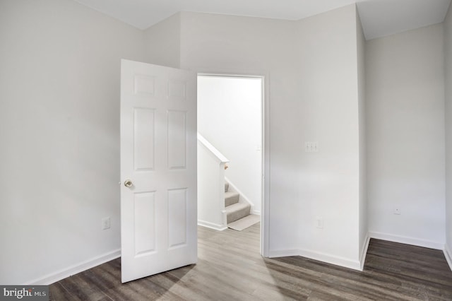 empty room featuring wood-type flooring