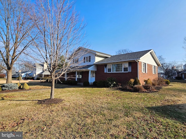 view of front of home with a front yard