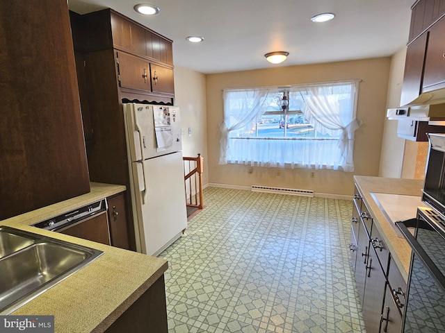 kitchen featuring dark brown cabinetry, sink, a baseboard radiator, black dishwasher, and white fridge