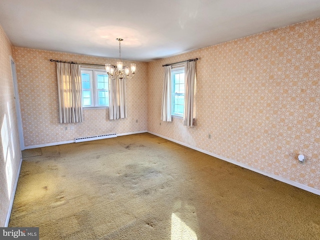 carpeted empty room featuring a notable chandelier, a healthy amount of sunlight, and a baseboard radiator