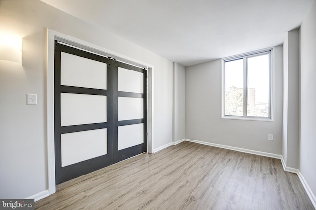 empty room featuring light wood-type flooring