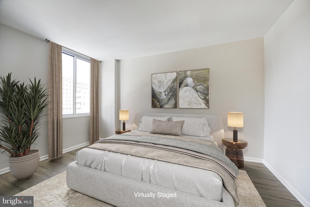 bedroom featuring dark hardwood / wood-style floors