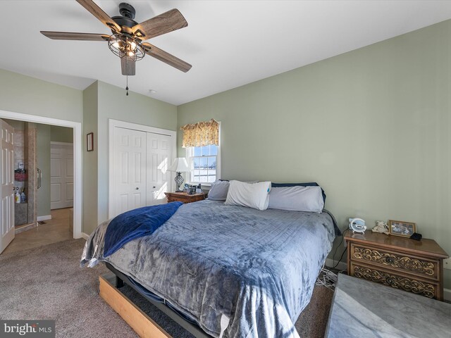 bedroom with ceiling fan, a closet, baseboards, and carpet flooring