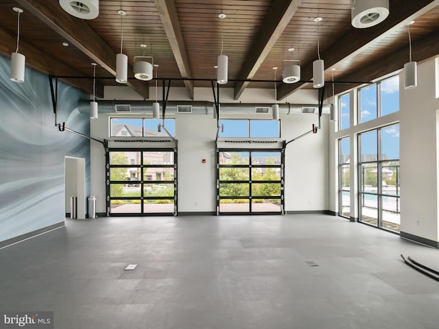 garage featuring wooden ceiling