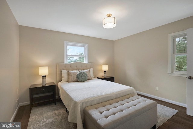 bedroom featuring dark hardwood / wood-style flooring