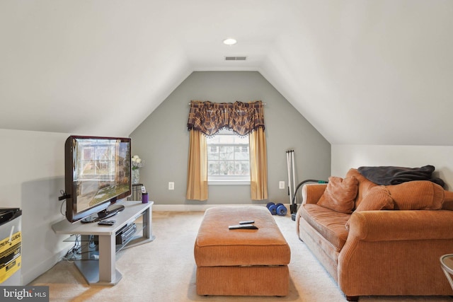 living room with lofted ceiling and light carpet