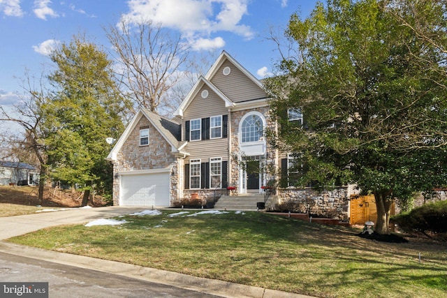 view of front of property featuring a garage and a front lawn