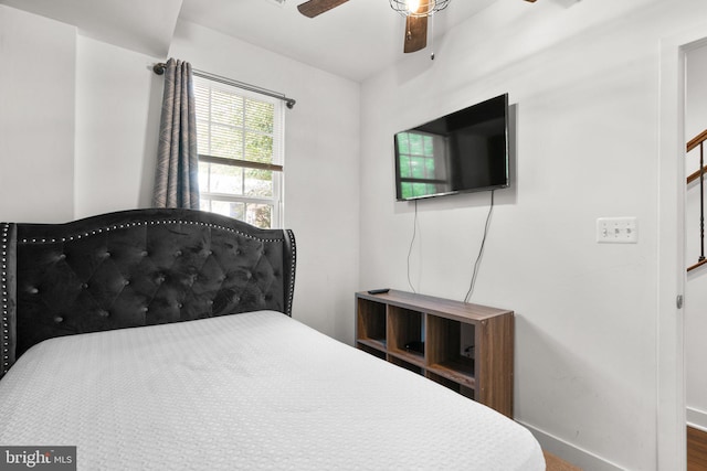 bedroom featuring ceiling fan