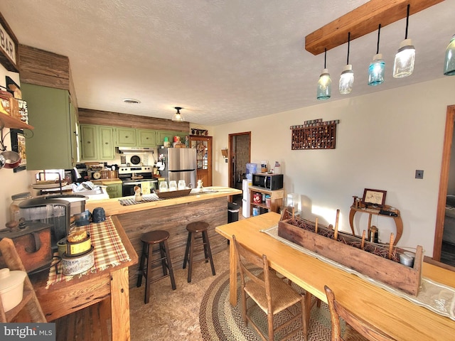 dining area with a textured ceiling