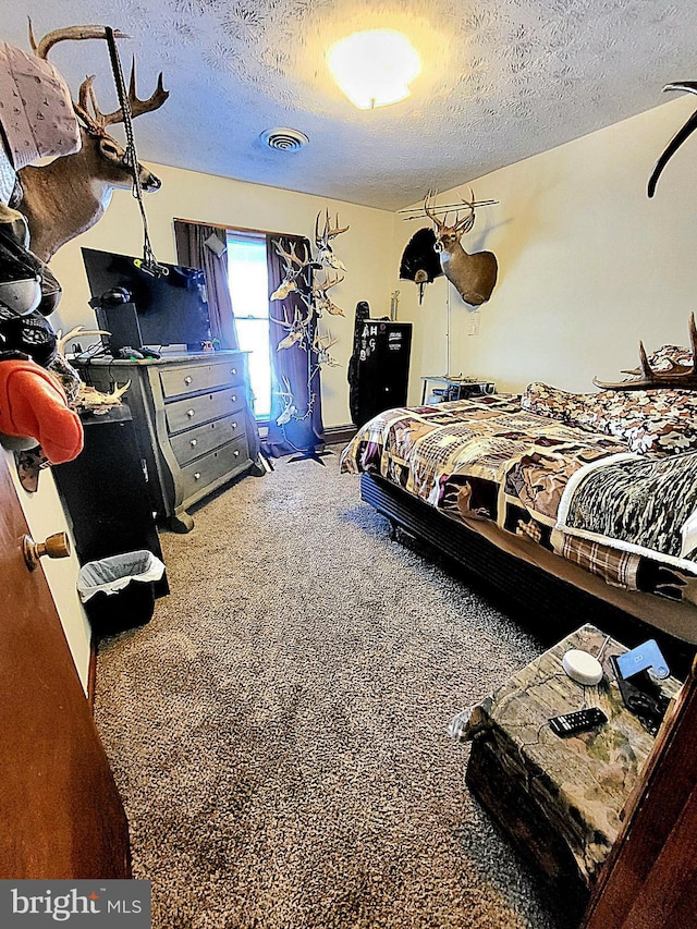 bedroom with a textured ceiling