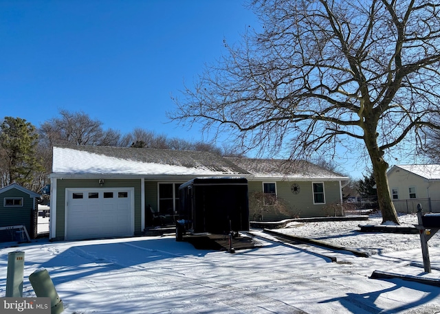 view of front of home with a garage