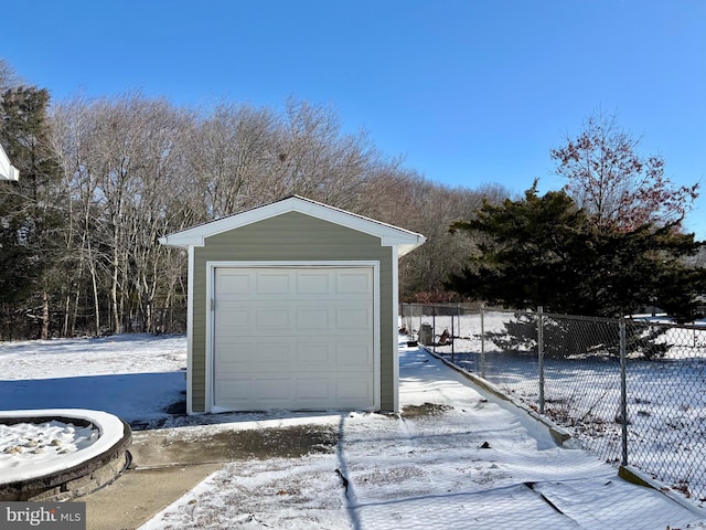 view of snow covered garage