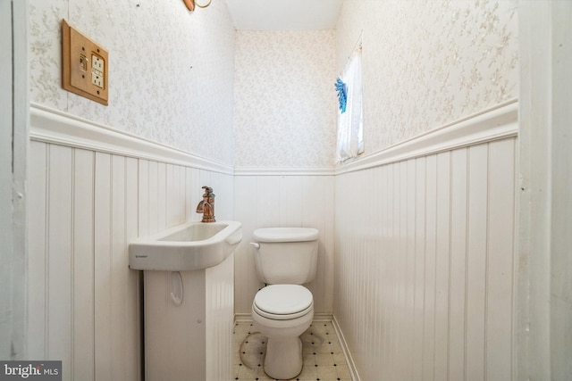 bathroom featuring toilet