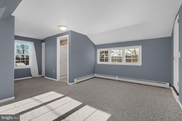 bonus room featuring carpet floors, a baseboard radiator, and lofted ceiling