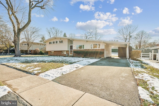 split level home with a carport