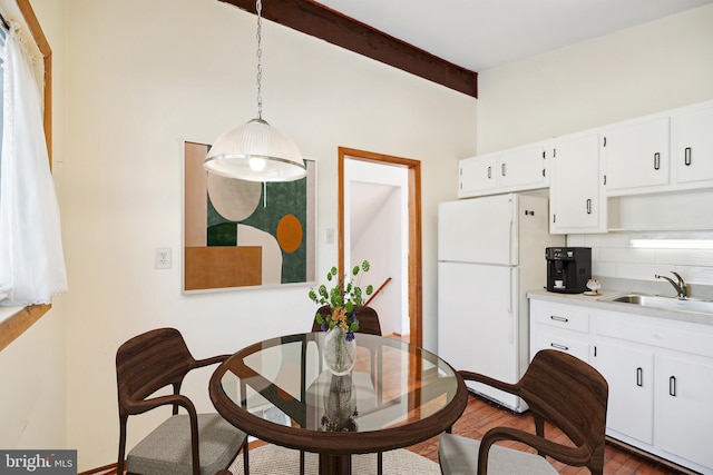 dining space with sink