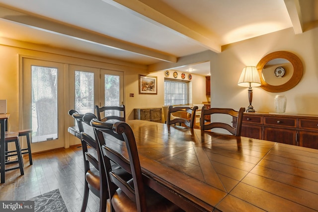 dining space with wood-type flooring, french doors, and beam ceiling