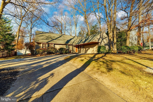 single story home with a garage