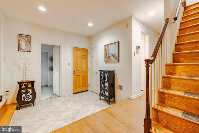 hallway with light tile patterned floors