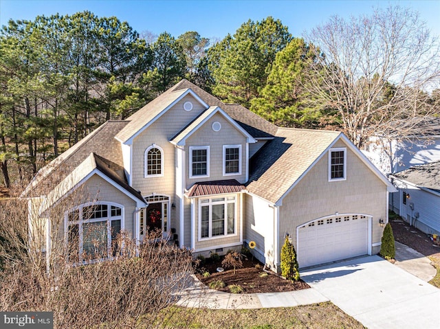 front of property with a garage