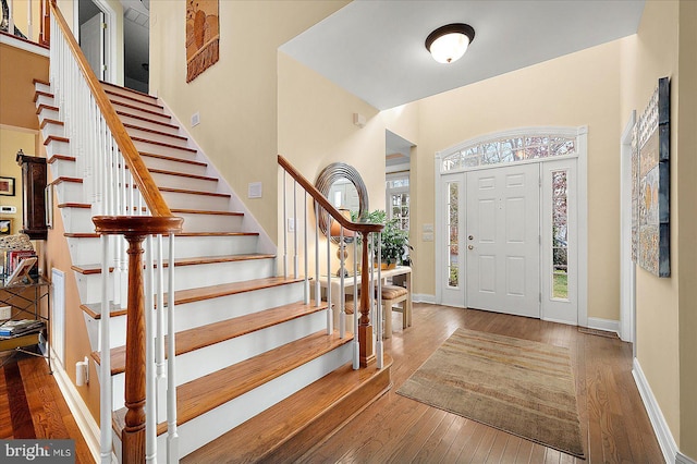 entrance foyer with hardwood / wood-style floors