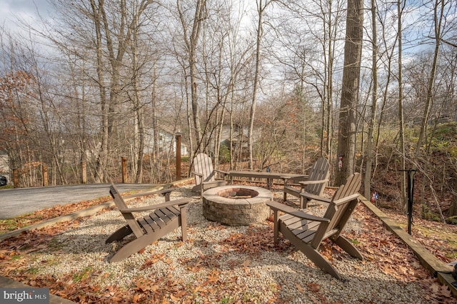 view of patio / terrace with an outdoor fire pit